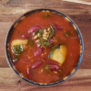 Vegan bean and farro soup with spinach and zucchini in a lightly seasoned tomato broth. at Provisions Natural Foods Market in Sag Harbor