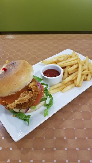 Buffalo ranch chickun burger. It's HUGE! at Loving Hut in Charlotte