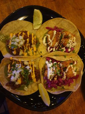 Fable carnitas taco $10.00, Fried calamari taco $10.00 at Calle Rey in Newtown