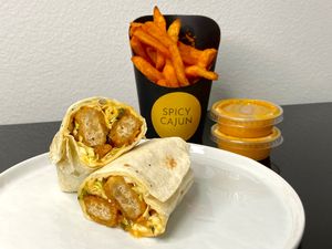 spicy chicken honey wrap + Cajun fries w/crack sauce (plated at home) at Moe Vegan in Kent