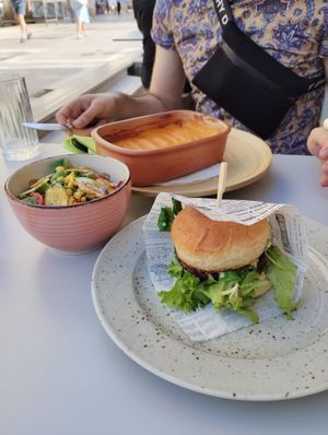 Truffle burger with seasonal salad and shepherd's pie in the back at VEG in Split