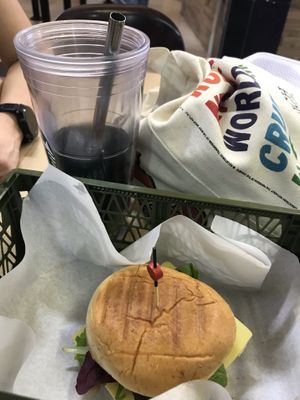 savoury sesame burger and wheatgrass drink. bring your own cup to save some plastic (-: at Veggie Dojo in Central Singapore