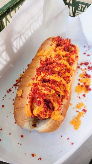 nacho cheese and bacon Beyond Sausage hot dog at Veggie Dojo in Central Singapore