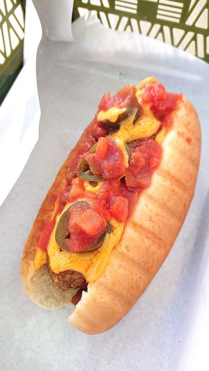 nacho cheese and salsa Beyond Sausage hot dog at Veggie Dojo in Central Singapore