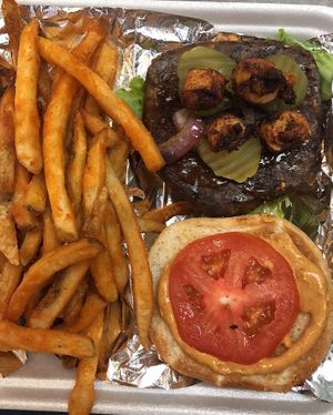 Delicious Kraburger with fries  at KraVegan in Jacksonville