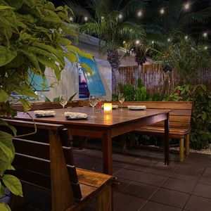 Outdoor patio seating at Blanchards Restaurant at Blanchards Restaurant and Beach Shack in West End Village