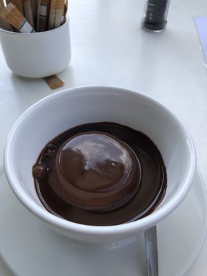 Melted chocolate on home made ice cream ❤️ at The Greenside Cafe in Johannesburg