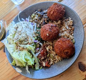 White bean fritter with rice, mushroom mix and salad at Nana Veg in Salvador