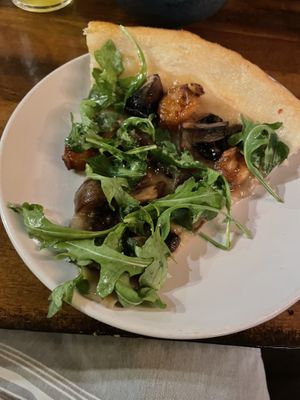 Underdone pizza. Mushrooms were good texture but bland. Sweet garlic purée with 3-5 cloves of garlic per slice (in a bad way somehow). One note and not a good one    at Pickled Fish in Long Beach