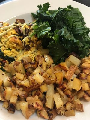 Vegan tofu scramble and delicious potatoes! at Blossoming Lotus - Irvington in Portland