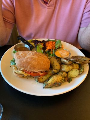 Veggie burger with fingerling potatoes was delicious  at Blossoming Lotus - Irvington in Portland
