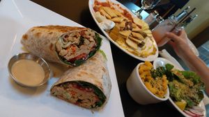 Thai wrap, cheeze board, mac and cheeze, caesar salad at Blossoming Lotus - Irvington in Portland