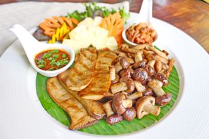 Grilled mushrooms with kimchi at Shewe Vegan & Vegetarian Cafe in Chiang Mai