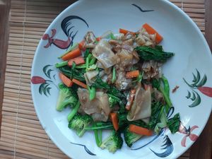 flat rice noodles with veggies at The Kitchen at Yenakat in Bangkok