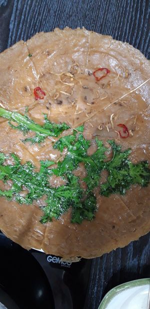 Jeon made with acorn powder, chicory, red pepper, and mushrooms at Dotori Kalguksu in Seoul