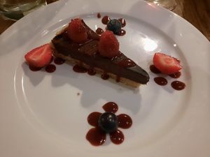 Rich chocolate tart with fruit at The Bull on Bell Street in Henley-on-thames