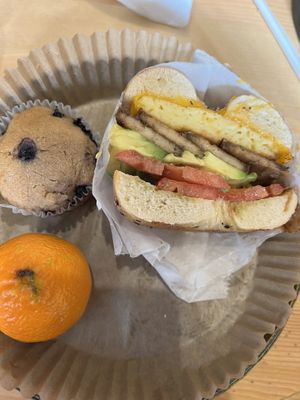 Half bagel #6 vegan with blueberry muffin and clementine. (I had already eaten the other half before the photo. ☺️)  at UT47 Manhattan in New York City