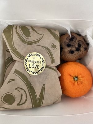 Vegan breakfast sandwich and comes with a vegan blueberry muffin and orange - so cute!  at UT47 Manhattan in New York City