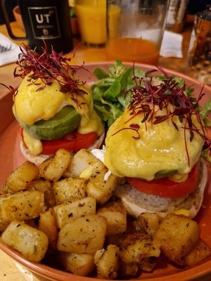 Vegan avocado tomato egg benedict. at UT47 Manhattan in New York City