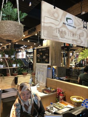 Owner and logo at Indo Tempeh House in Christchurch