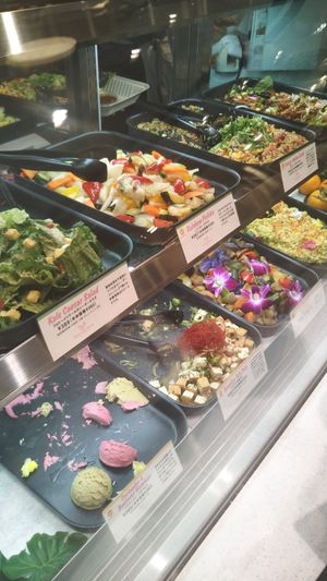 Salad on top and sides on bottom at Peace Cafe - Shibuya Scramble Square in Tokyo