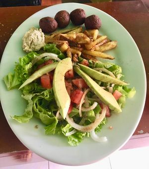 Falafel, hummus, fries and salad at Ali Mama in Huanchaco