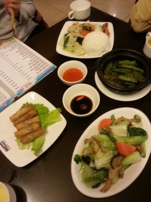 braised veg with rice, fried okra, spring rolls, pak choi with mushrooms at Vegan Heaven in Da Lat