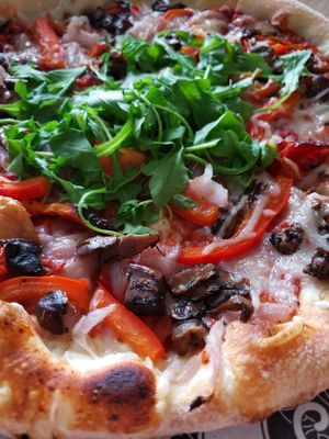 Delicious pizza at Basil & Board in Salem