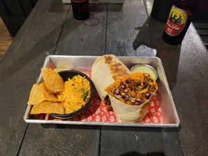 Burrito Al Pastor in large. at Taco Taco in Monteverde