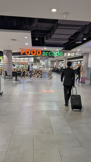 Head to food court Level 2 - Look for illuminated Vegetarian sign. at KUL - VegTalk Station - KLIA 2 in Sepang