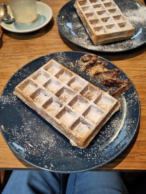 Pistachios-filled waffle with chocolate-hazelnut spread on the side at Pardon in Brussels