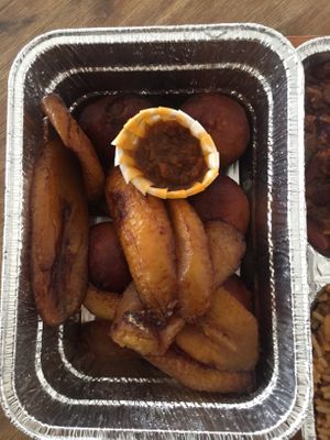 part of mixed plate: fried plantains and yeast balls with spicy sauce (take away) at Patacon-Obi - Falafel Café in Stuttgart