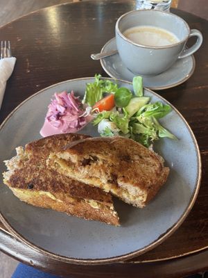 Hummus/falafel toastie with an oat chai latte  at Cafe Etch in Middlesbrough