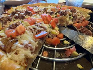 A heavy pizza for a heavy appetite / person   at UNO Pizzeria in Ellicott City