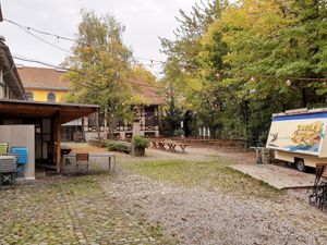Large outdoor seating (in autumn) at Riithalle in Zurich