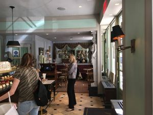 Inside store: notice sitting area at far end at Ladurée - Lenox Hill in New York City