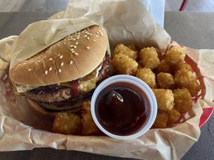 BBQ cheese burger with tater tots.  at Nice Burger - Costa Mesa in Costa Mesa