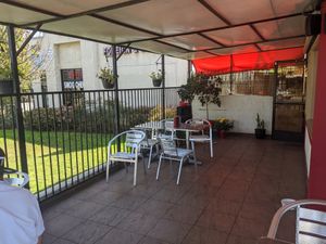 Clean, inviting, outside eating area at Nice Burger - Costa Mesa in Costa Mesa