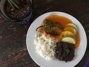 Chile relleno de vegetales en salsa de tomate at Corazón de Hemp in Cabo San Lucas