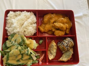 Lunch special - spicy cajun shrimp, salad, 2 dumplings, 2 sushi rolls, white rice and soup for 13.80 at Chef Kenny's Asian Vegan Cuisine in Houston