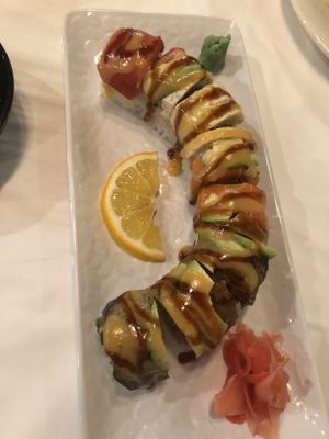Rainbow roll -vegan eel tofu salmon and tuna with avocado on top, veggies inside at Chef Kenny's Asian Vegan Cuisine in Houston
