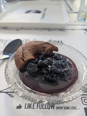 Surprise, complimentary mini dessert with black cherries and spiced cookie (vegan) at Tis Mammis Sou in Rhodes