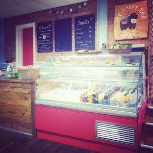 Our cafe counter made from recycled wood. at The Happy Yak Cafe in Leeds