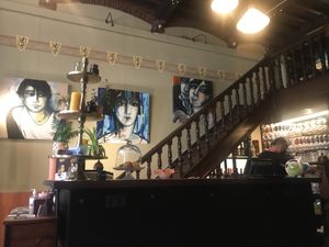 Cosy atmosphere  with original paintings  at Atelier Flori in Bruges