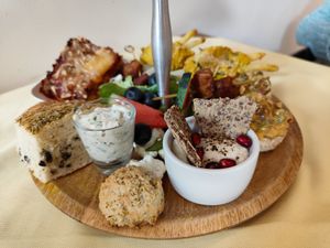 Etagere with mixed food. at Atelier Flori in Bruges
