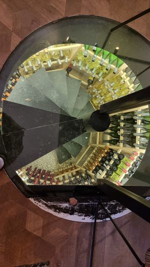 Wine cellar, view from floor restaurant room at Atelier Flori in Bruges