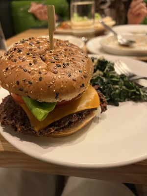 Vegan double cheeseburger with kale salad  at True Food Kitchen in New Orleans