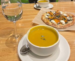 Vegan squash soup + pizza  at True Food Kitchen in New Orleans