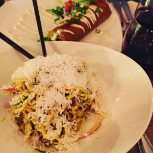 Curry noodles and burrito at Raw Aura in Mississauga