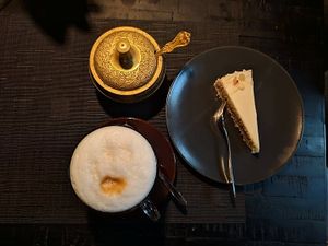 vegan cake and almond latte at SOMA Cafe in Vilnius
